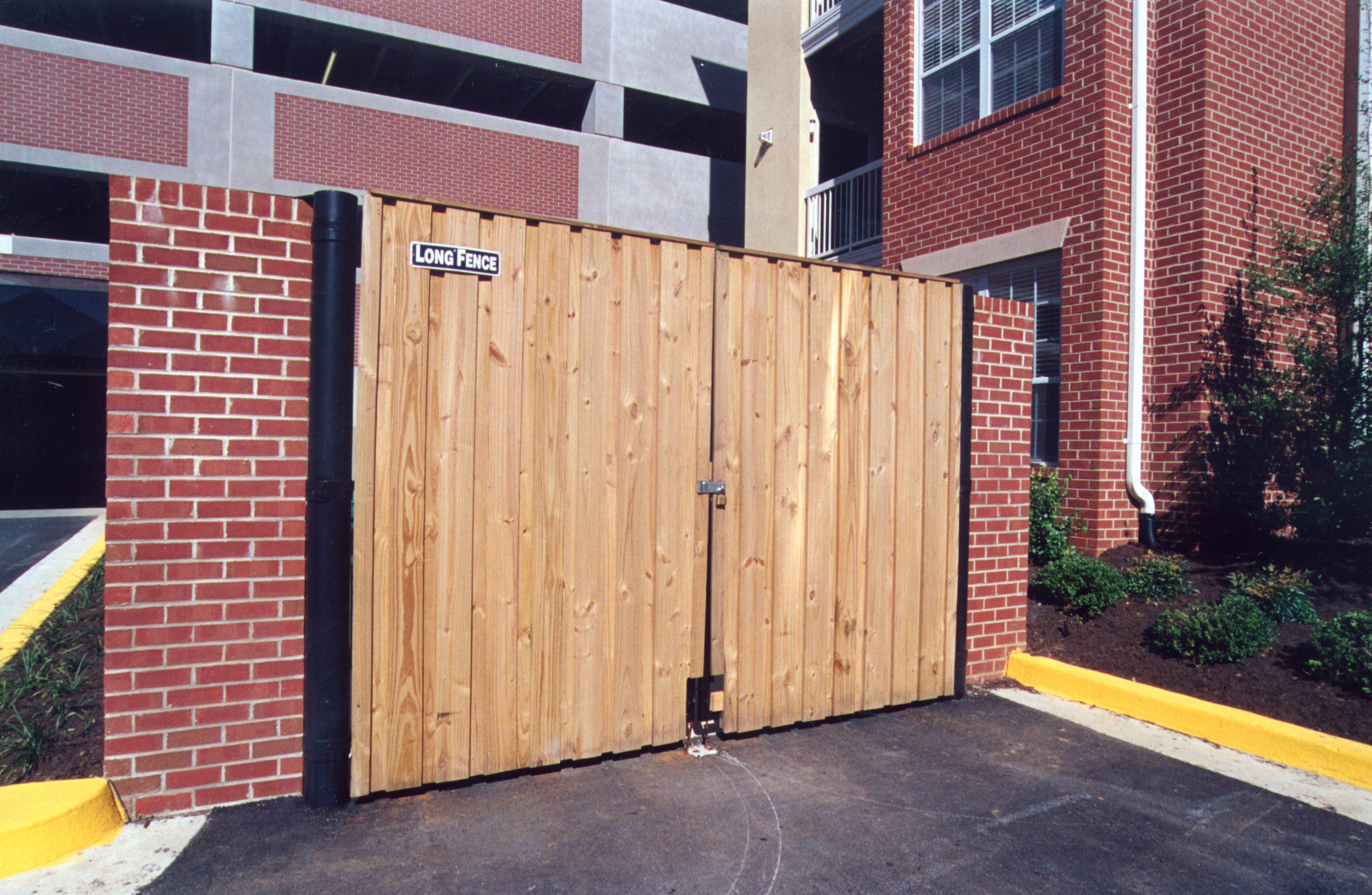 https://www.longfence.com/wp-content/uploads/2021/02/wood-utility-enclosure.jpg